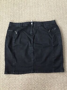 Pennington’s Black Mini Skirt with Zip Pocket Accents